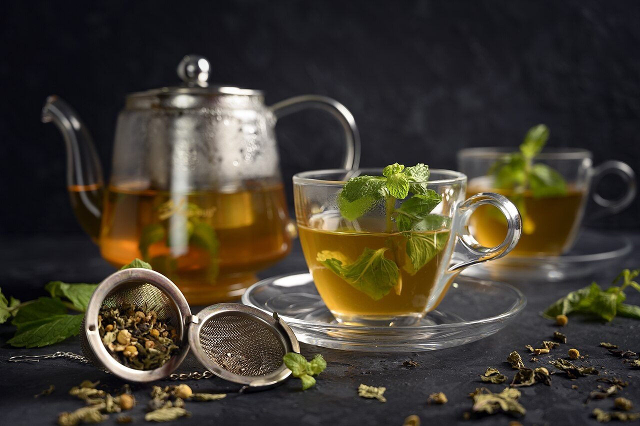 Mint tea being poured in a Berber desert camp in the Erg Chebbi dunes