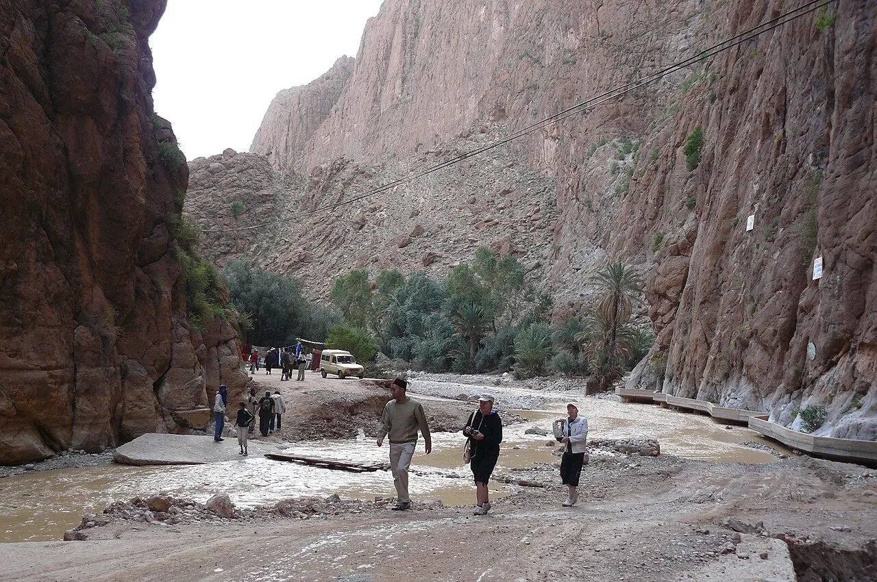 Towering limestone walls of the Todra Gorge near Tinghir with the river at the bottom