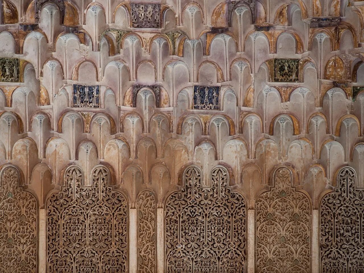 Carved cedar and marble columns in the Hall of Twelve Columns at the Saadian Tombs