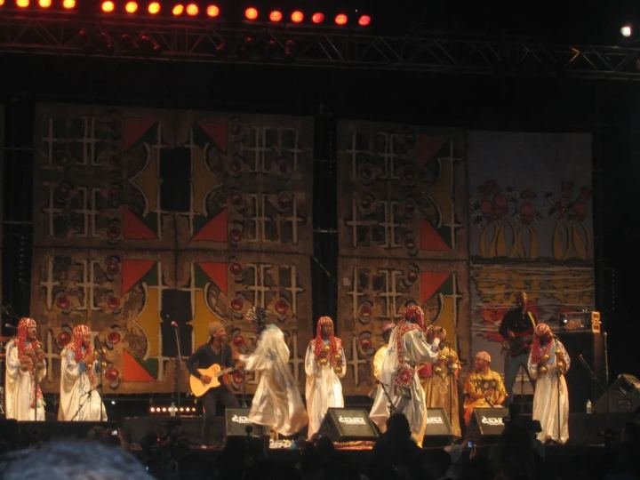 Gnawa musicians in traditional dress performing in Essaouira