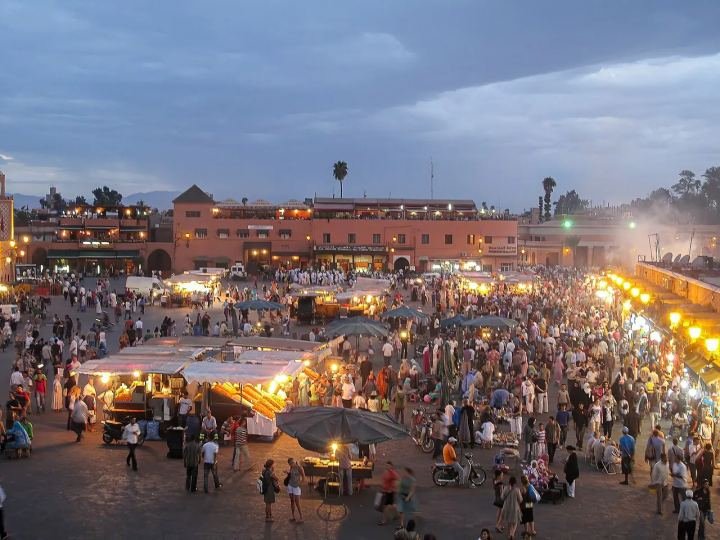 Evening crowds and food stalls on Jemaa el-Fnaa square in Marrakech