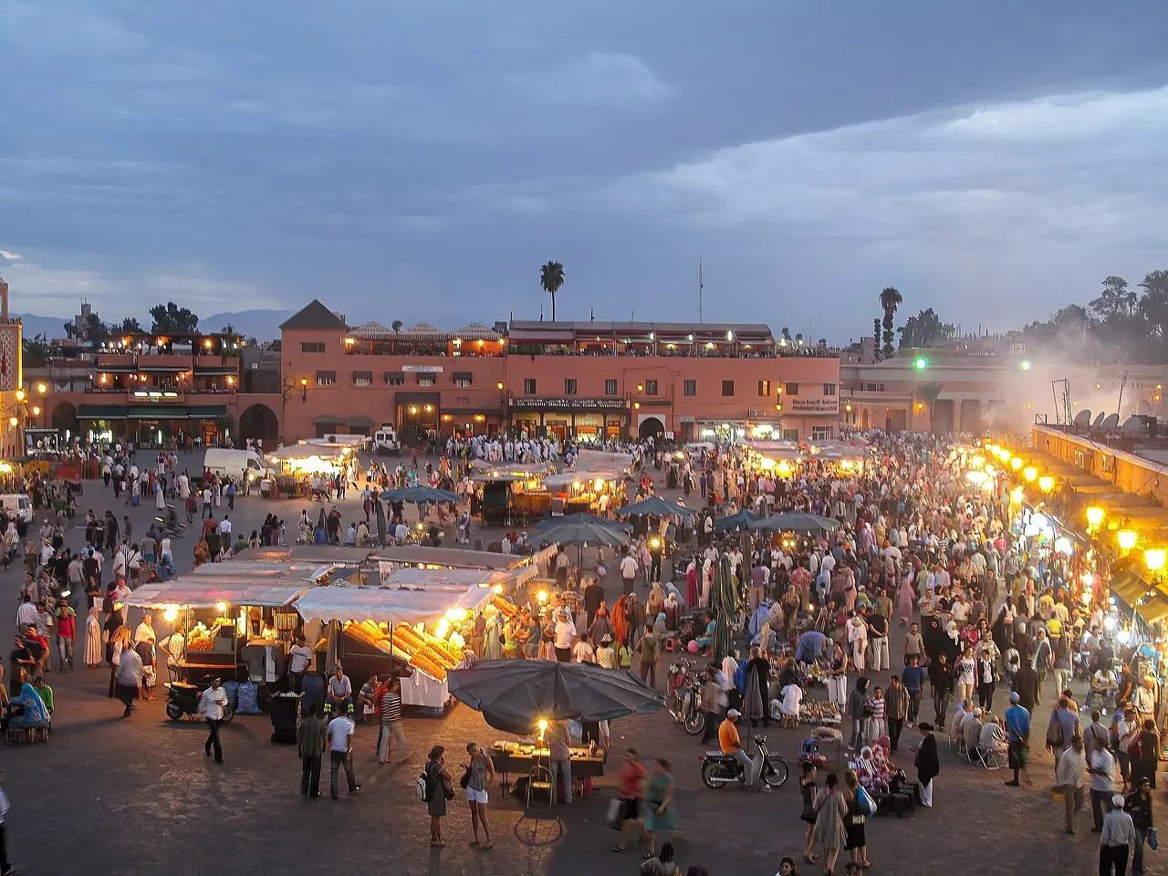 Evening crowds and food stalls on Jemaa el-Fnaa square in Marrakech