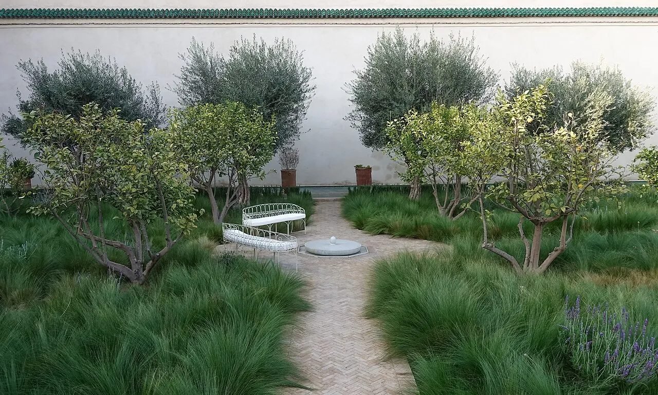 Water channels and planted beds in the Islamic garden of Le Jardin Secret, Marrakech